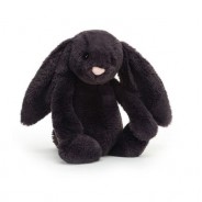 Pluszowy króliczek w czarnym kolorze z długimi uszami.