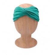 Bawełniana opaska na głowę w zielonym kolorze.